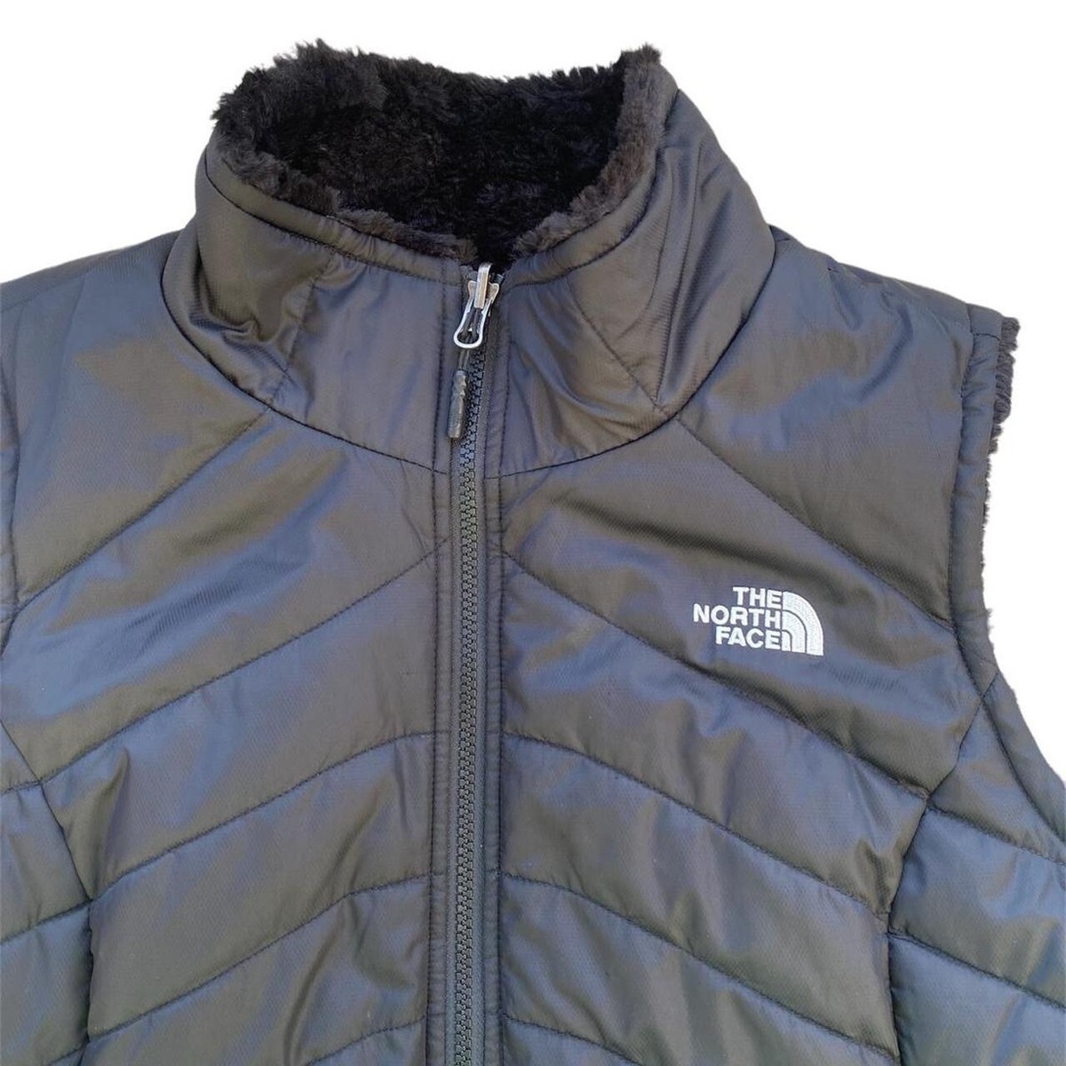 North Face Mossbud Swirl Reversible Vest in BlackFall/winter