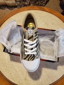 gold tennis shoes womens