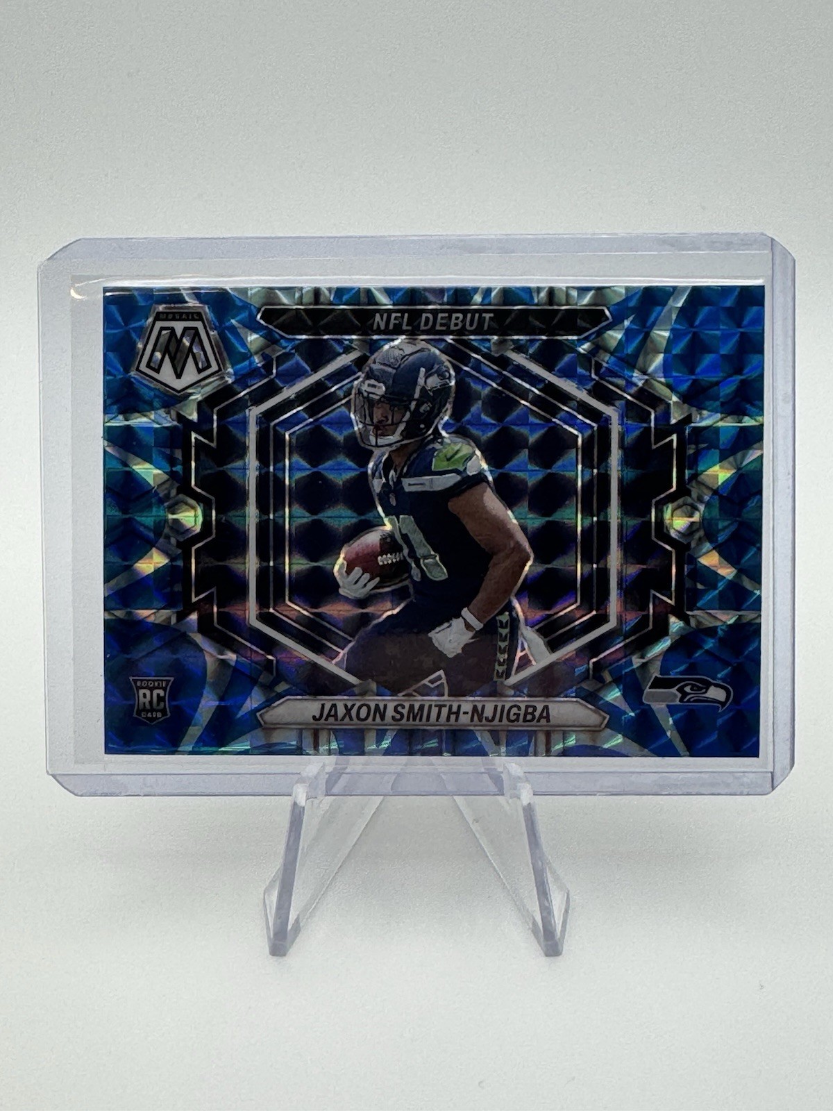 2023 Panini Mosaic - Nfl Debut Jaxon Smith-Njigba #ND-12 Reactive Blue Mosaic RC