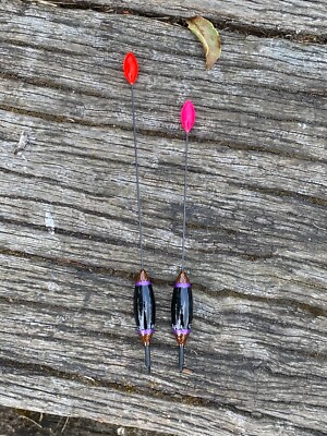 A pair of JRB Handmade traditional style carbon stem drift beater floats.