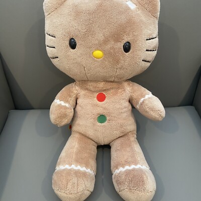 Sanrio Hello Kitty - Juego de juguetes de peluche de Navidad, paquete con felpa temática de pan de jengibre de Hello Kitty de 10 pulgadas y calcomanías, más | Muñeco de