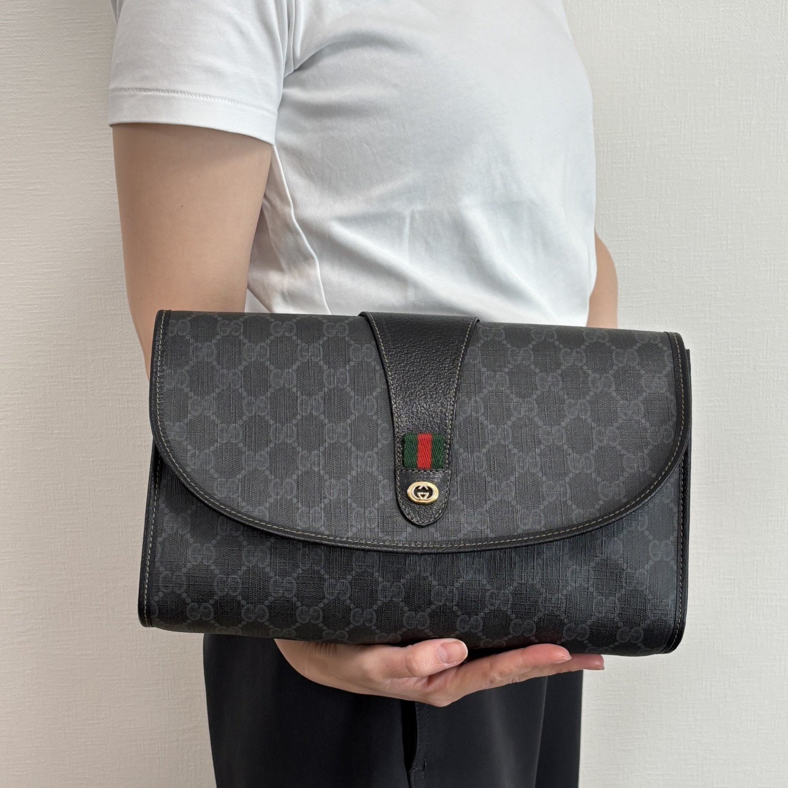 Borsa pochette Gucci nera GG Supreme linea Sherry pochette pelle PVC