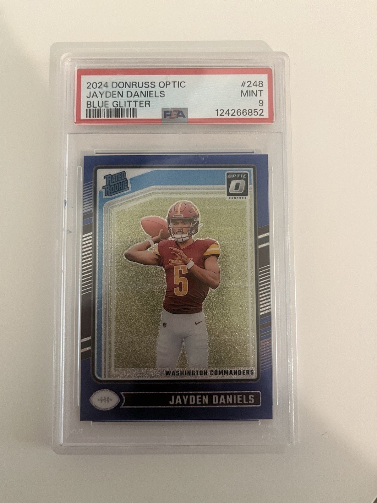2024 Panini Donruss Optic - Rated Rookie Jayden Daniels #248 Blue Glitter Prizm