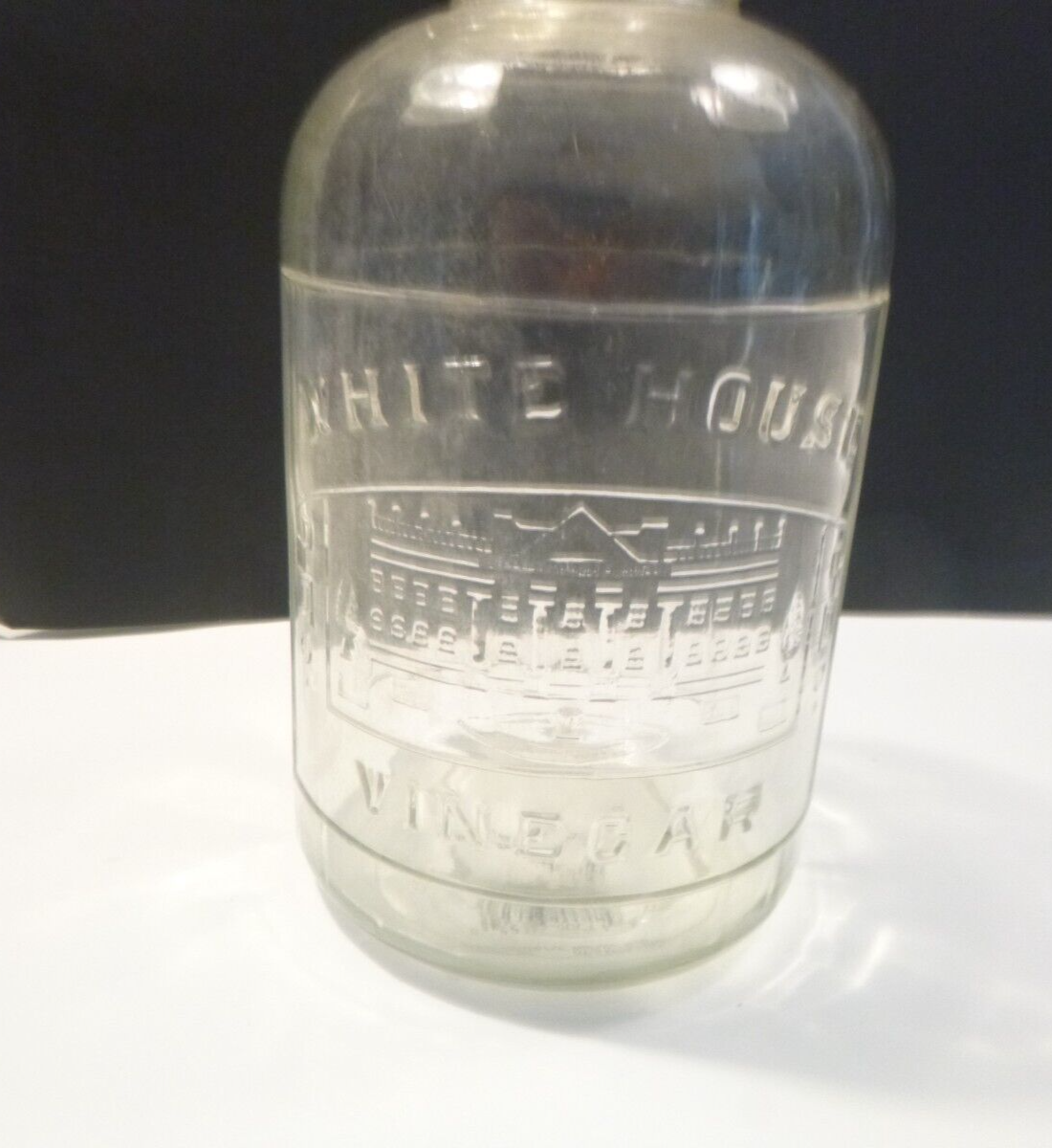 White House Vinegar Winchester VA 10 inch Handled Glass Jug half