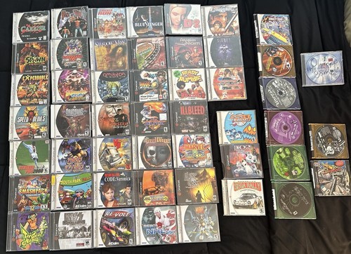 SEGA Dreamcast game lot with cases and discs, titles include Crazy, Sonic Adventure, and Illed.