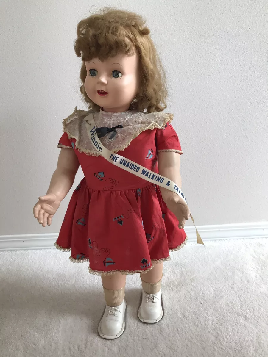 Winnie the walking cheap and talking doll