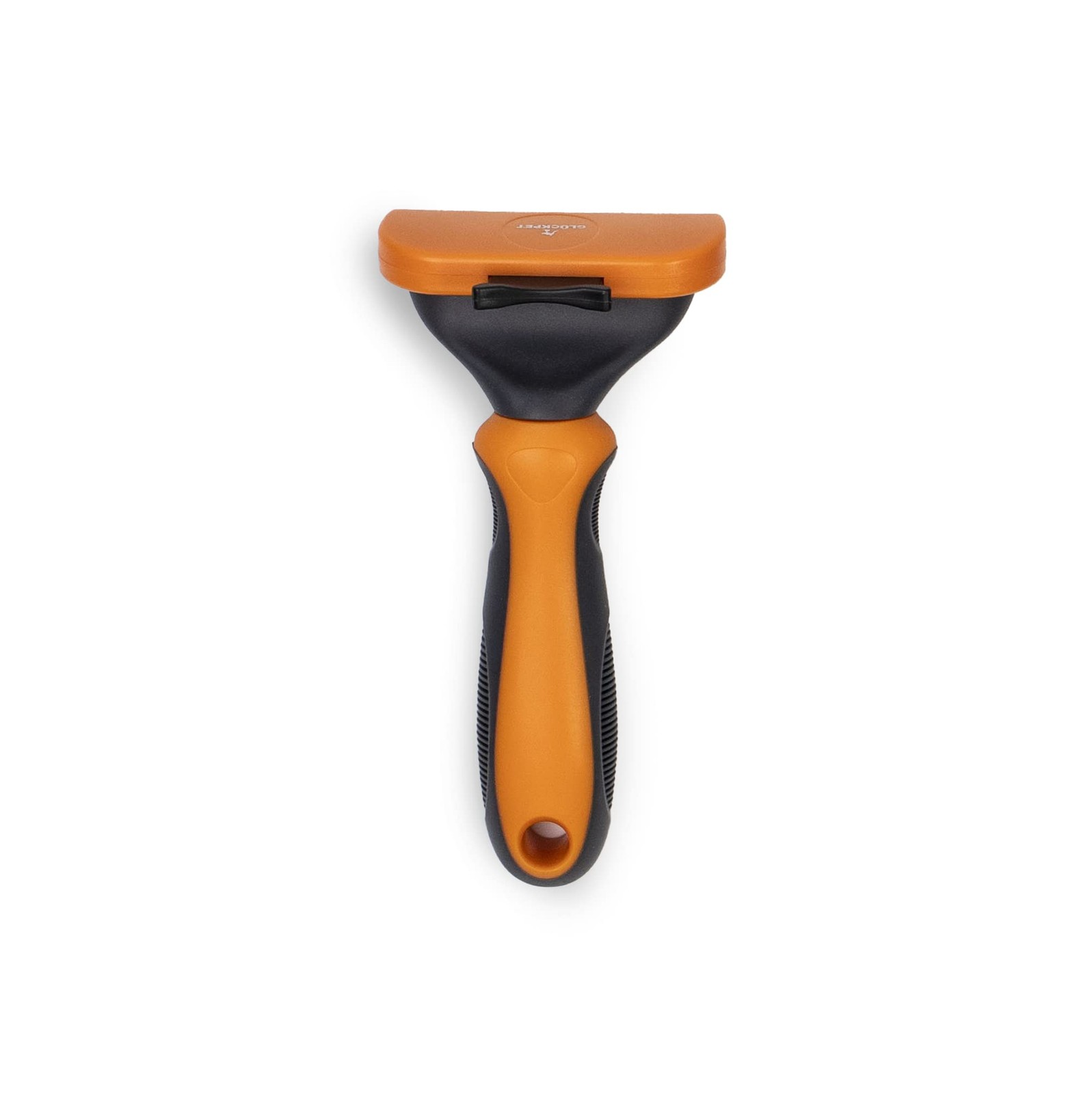 Brosse pour chien orange idéale pour le toilettage rapide au salon après la promenade