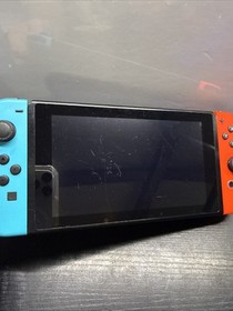 Nintendo Switch 32GB Console with Red And Blue Joy‑Con HAC-001(-01)