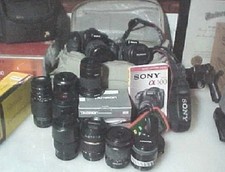 2 Sony Alpha DSLR Camera's 10 Sony A-Mount Lenses More Crazy A Steal