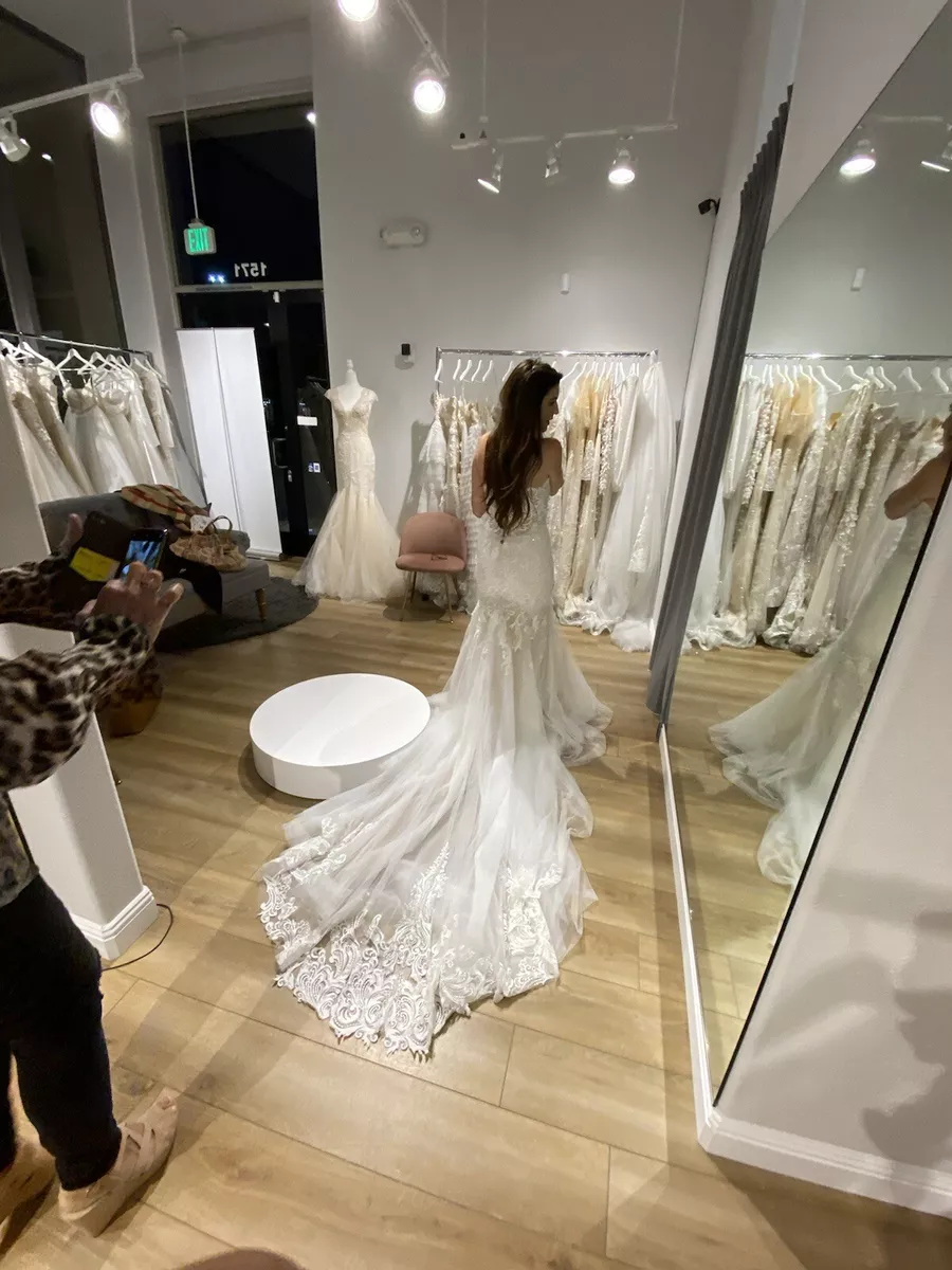 How much are clearance riki dalal wedding dresses