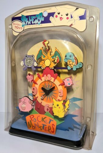 Vintage Tomy Pokemon Charizard Squirtle Pikachu Chansey Moving Clock Sealed - Picture 1 of 8