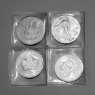 1 oz Silver Coins- 2-2026 Silver Eagles and 2-2026  Silver Maples. Lot of  4