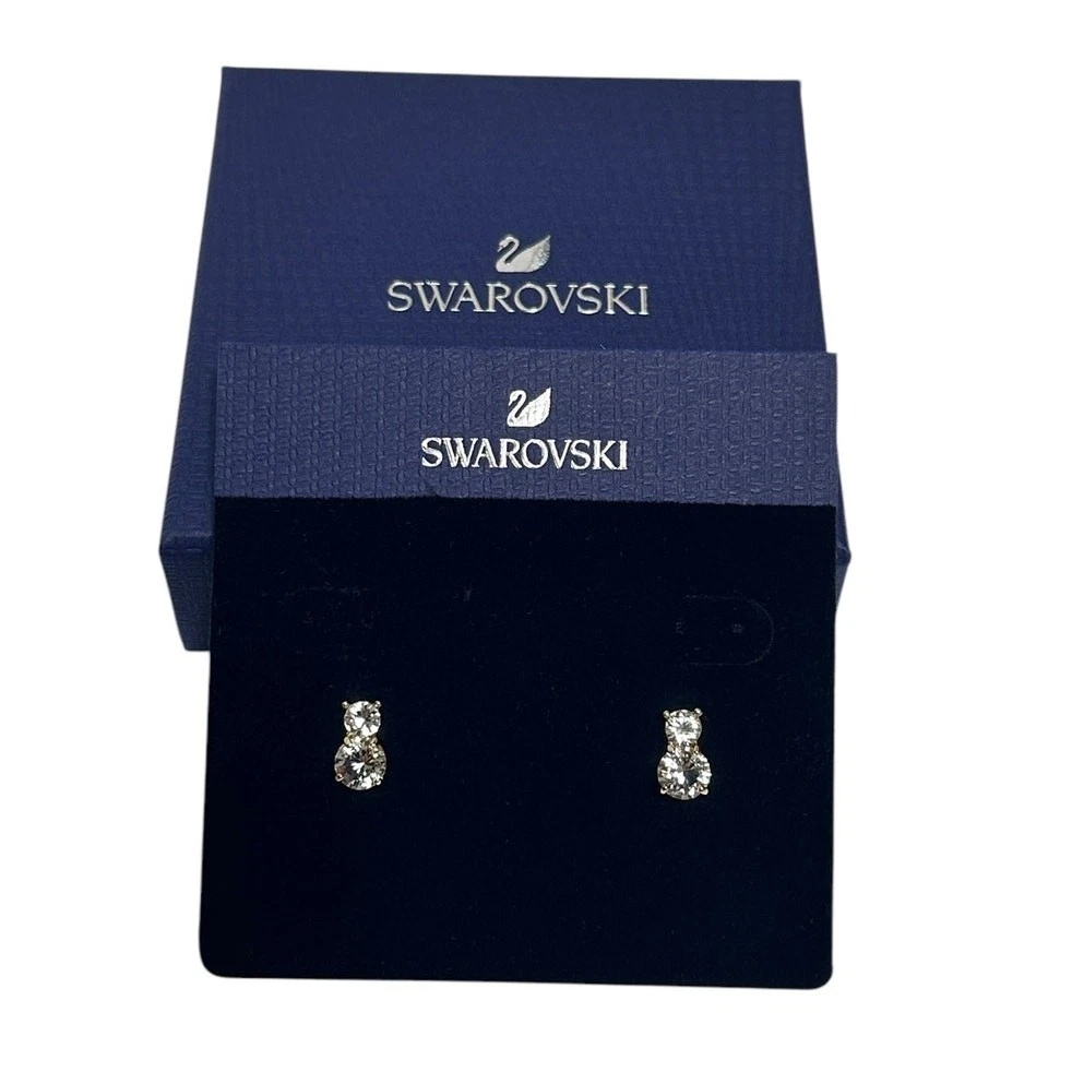 Swarovski Double Solitaire stud earrings Round cut, Crystal Gold t plated