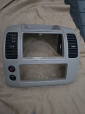 05-12 Nissan Pathfinder Frontier Dash Radio Trim Bezel Center Brown Oem