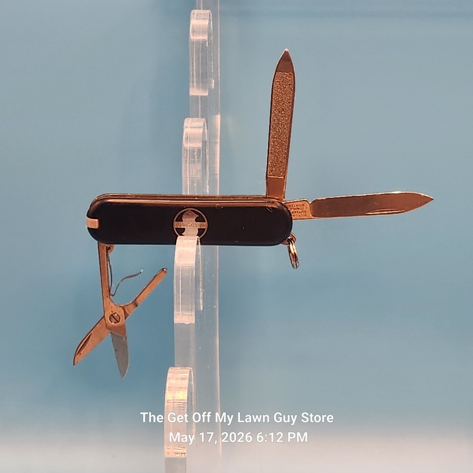A vintage Victorinox Classic with a rare Sunstrom inlay — not your drugstore Swiss Army knife, this is a collectible variant most people have never seen.
