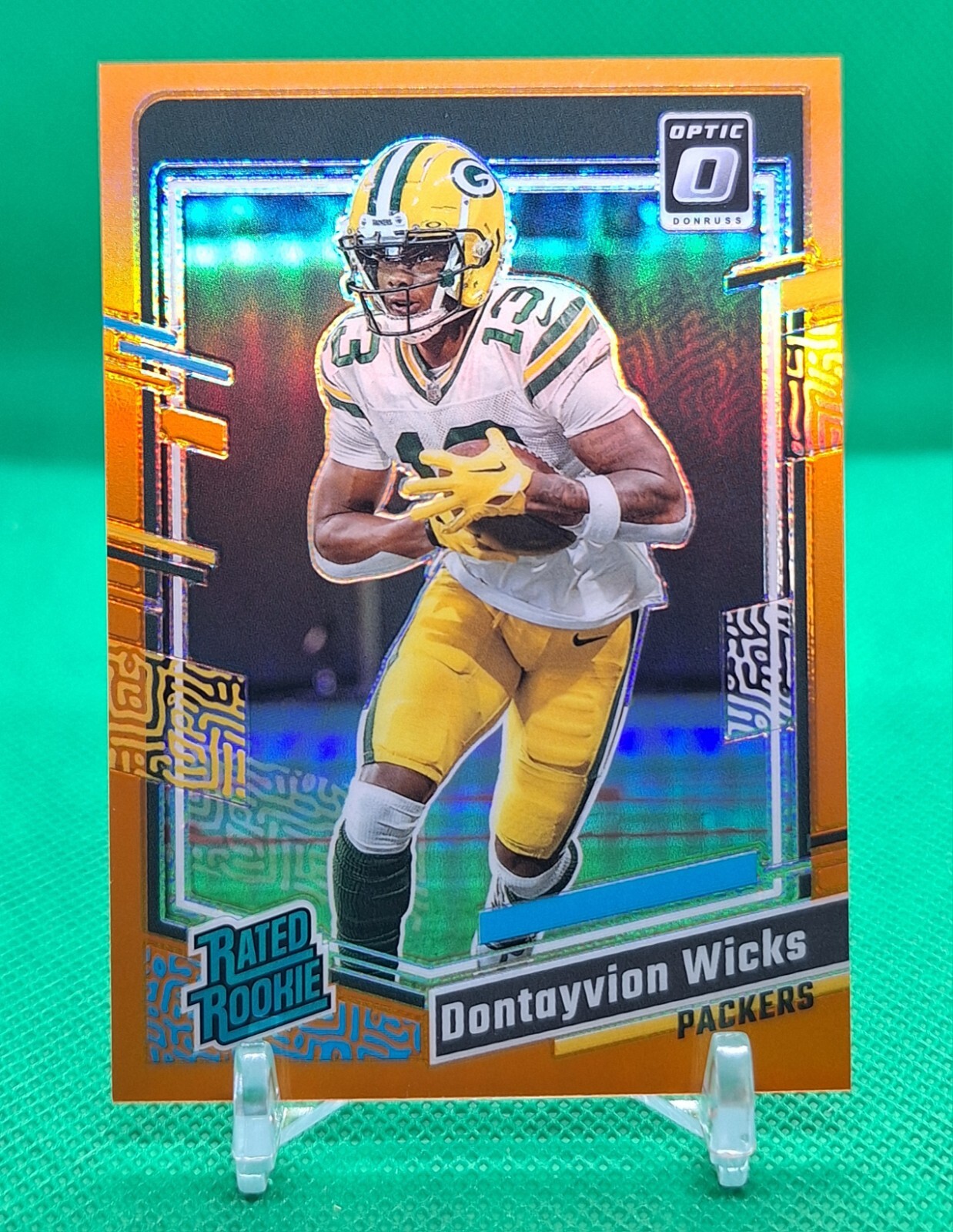 DONTAYVION WICKS 2023 Donruss Optic Orange Rated Rookie /249 (RC) Packers #249