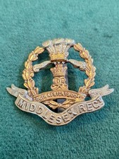 7 - 9TH BATTALION MIDDLESEX REGIMENT CAP BADGE BI METAL ON SLIDER ORIGINAL