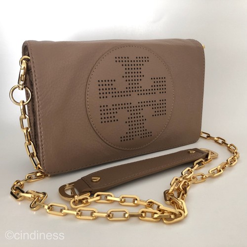 Top 89+ imagen is tory burch logo a cross Thptnganamst.edu.vn