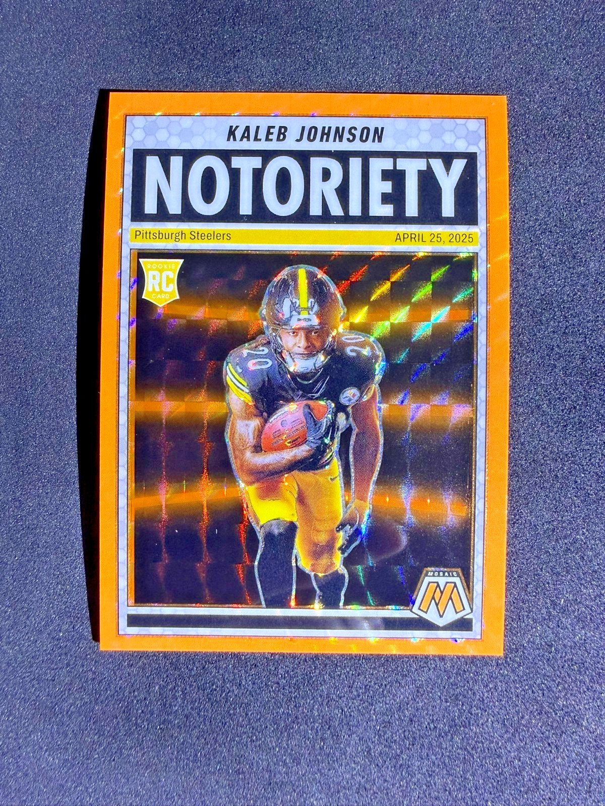 2025 Panini Mosaic Kaleb Johnson #22 Rookie Orange Fluorescent Prizm Notoriety