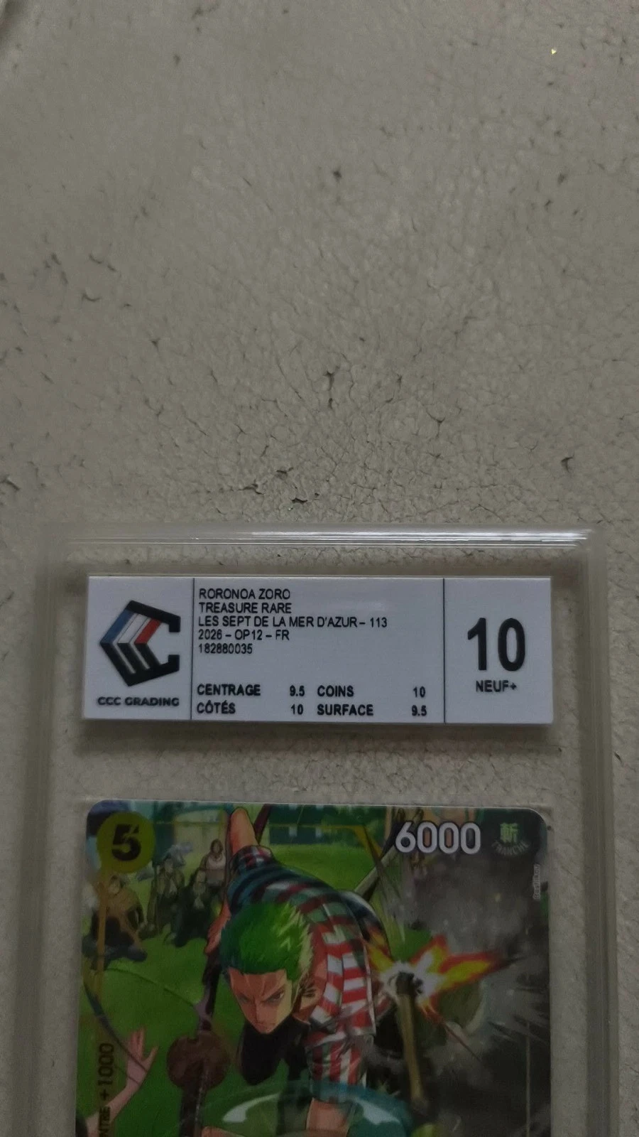 Verso de la carte Roronoa Zoro OP12-113 gradée CCC 10