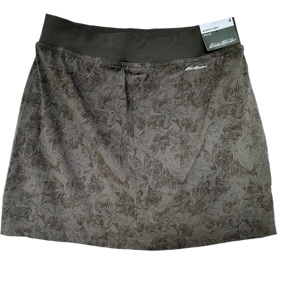 Falda corta floral Eddie Bauer ligeramente curvilínea UPF protección solar talla 4 tenis Foto 3 de 4