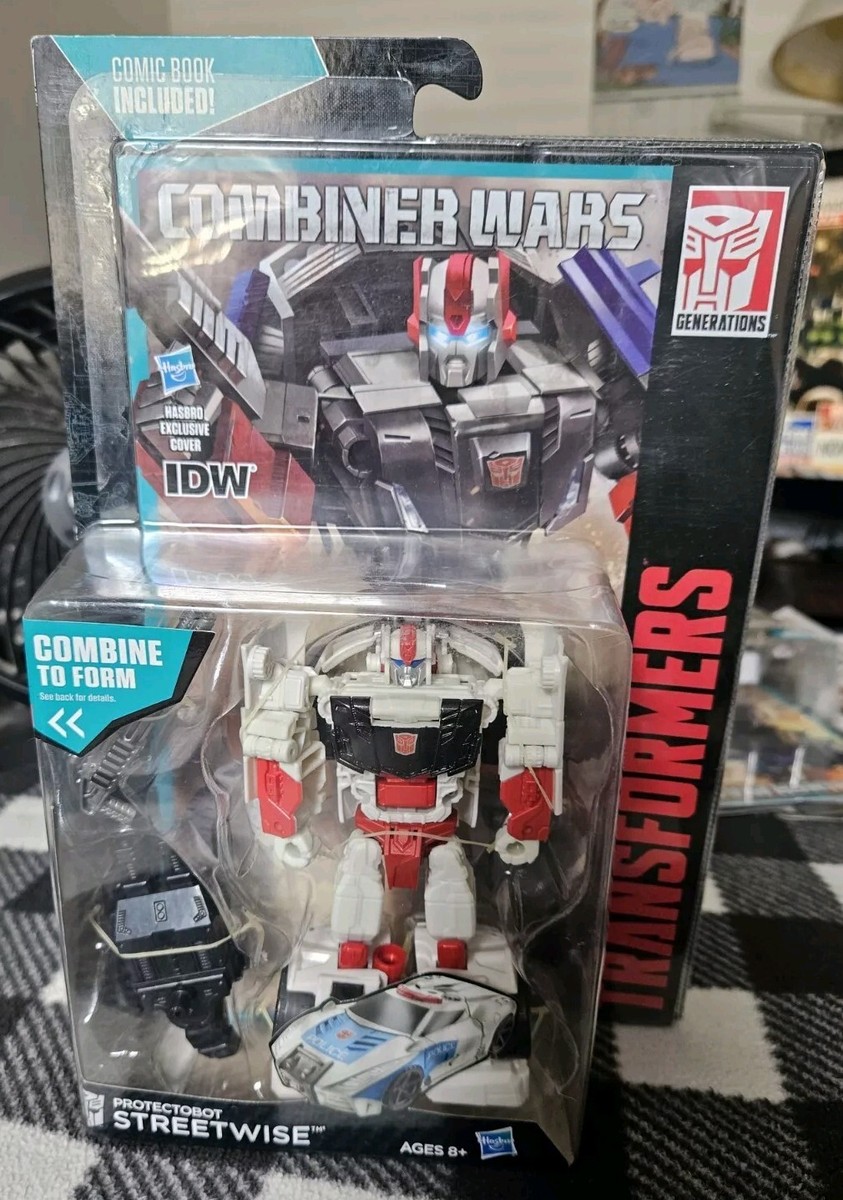 洋書 Transformers: Combiner Wars First Strike Transformers Volume 7: Combiner Wars--First Strike