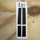 Seven black vintage Chevelle Malibu SS 454 decals with dual stripes, sealed in clear plastic packaging.