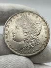 1886-O MORGAN DOLLAR AU  $1 SILVER COIN