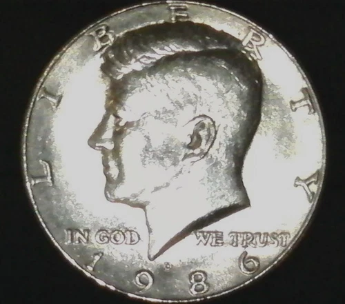 1986-D  Kennedy Half  GEM-BU BETTER DATE #A1