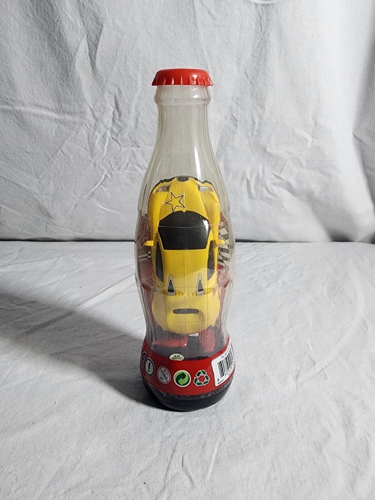 REMOTE RADIO CONTROL RACE CAR BRAND NEW PACKED IN A COLA BOTTLE