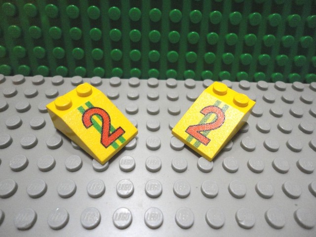 Lego 2 Yellow 3x2 printed sloped brick block #2 | eBay