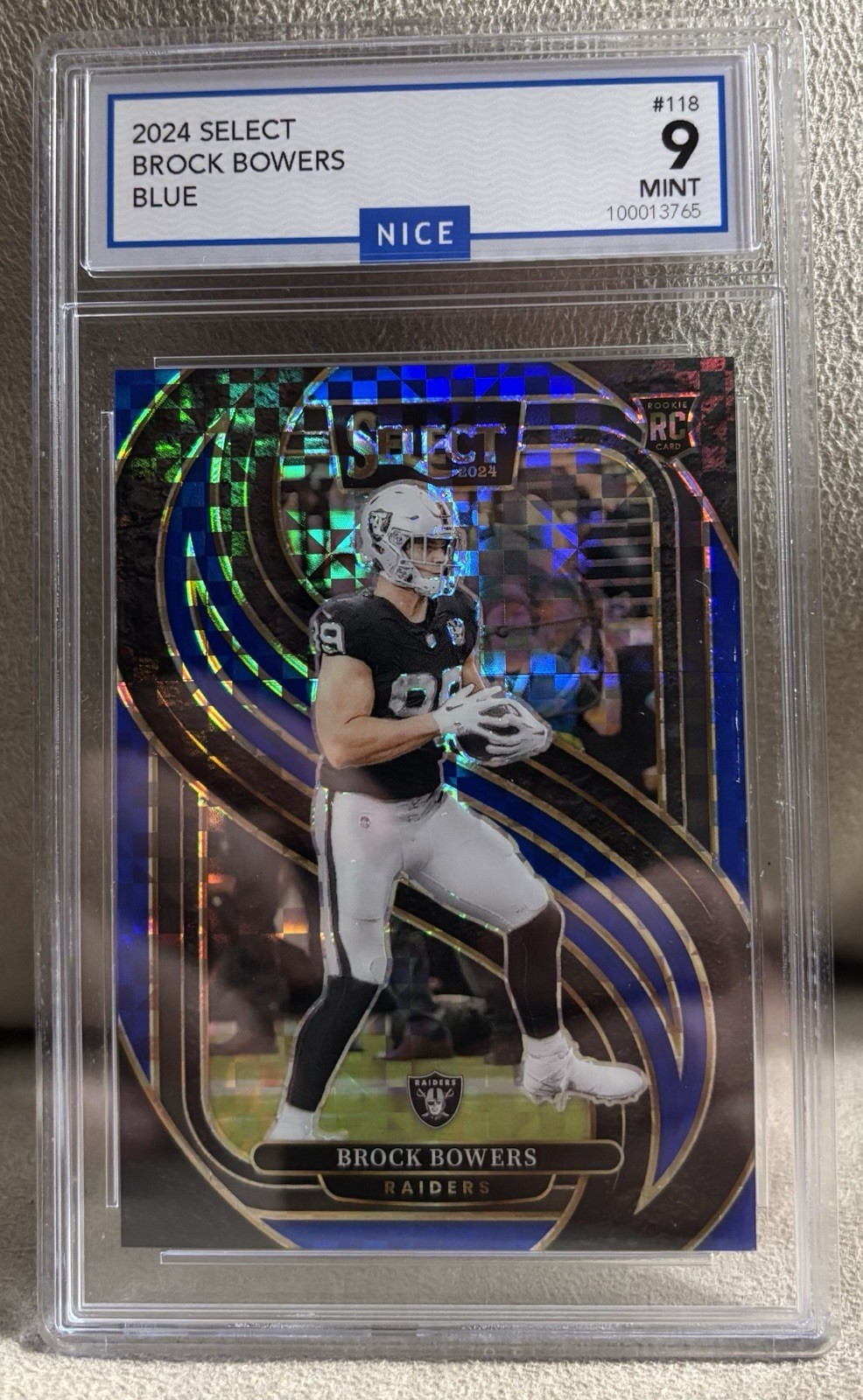 2024 Panini Select - Premier Level Brock Bowers #118 Blue Prizm /175 (RC)