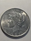 1923  E/FINE AU US Peace Silver Dollar       N602