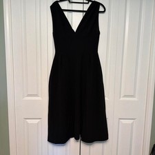 Black midi dress with V-neckline and sleeveless design #midi #vneck Zipper back