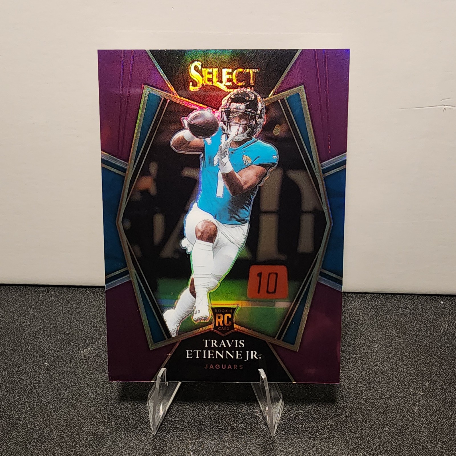 2021 Panini Select Travis Etienne Jr. Purple Prizm #154 RC #/75