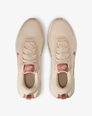 nike rose gold and white sneakers