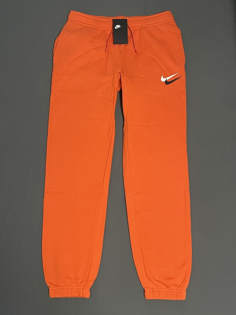 nike double swoosh joggers orange