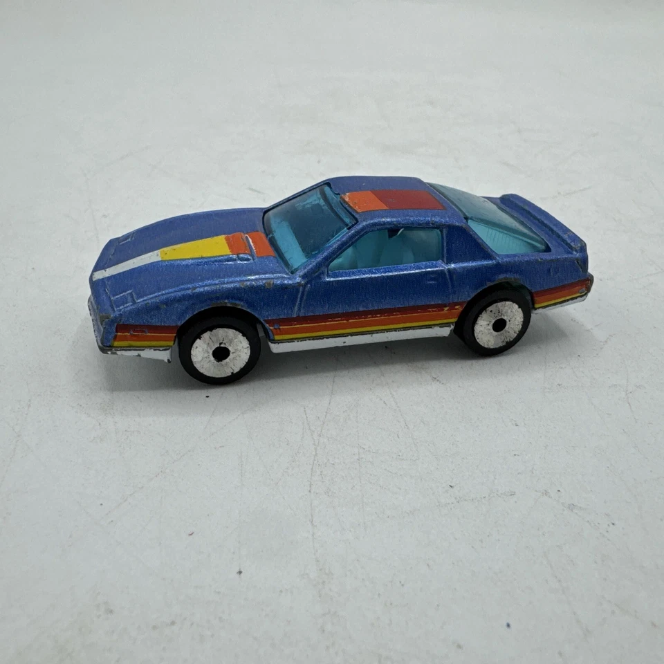 Matchbox Pontiac Firebird SE suelto 1:62 ruedas láser vintage 1982 azul Macao Foto 4 de 4