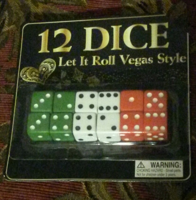7 total set12PK OF DICE NEW IN PACKAGE EACH SIDE IS ABOUT 1/2" RED