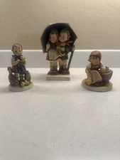 M.I. Hummel figurines by Goebel - Feeding Time, Stormy Weather, Chick Girl