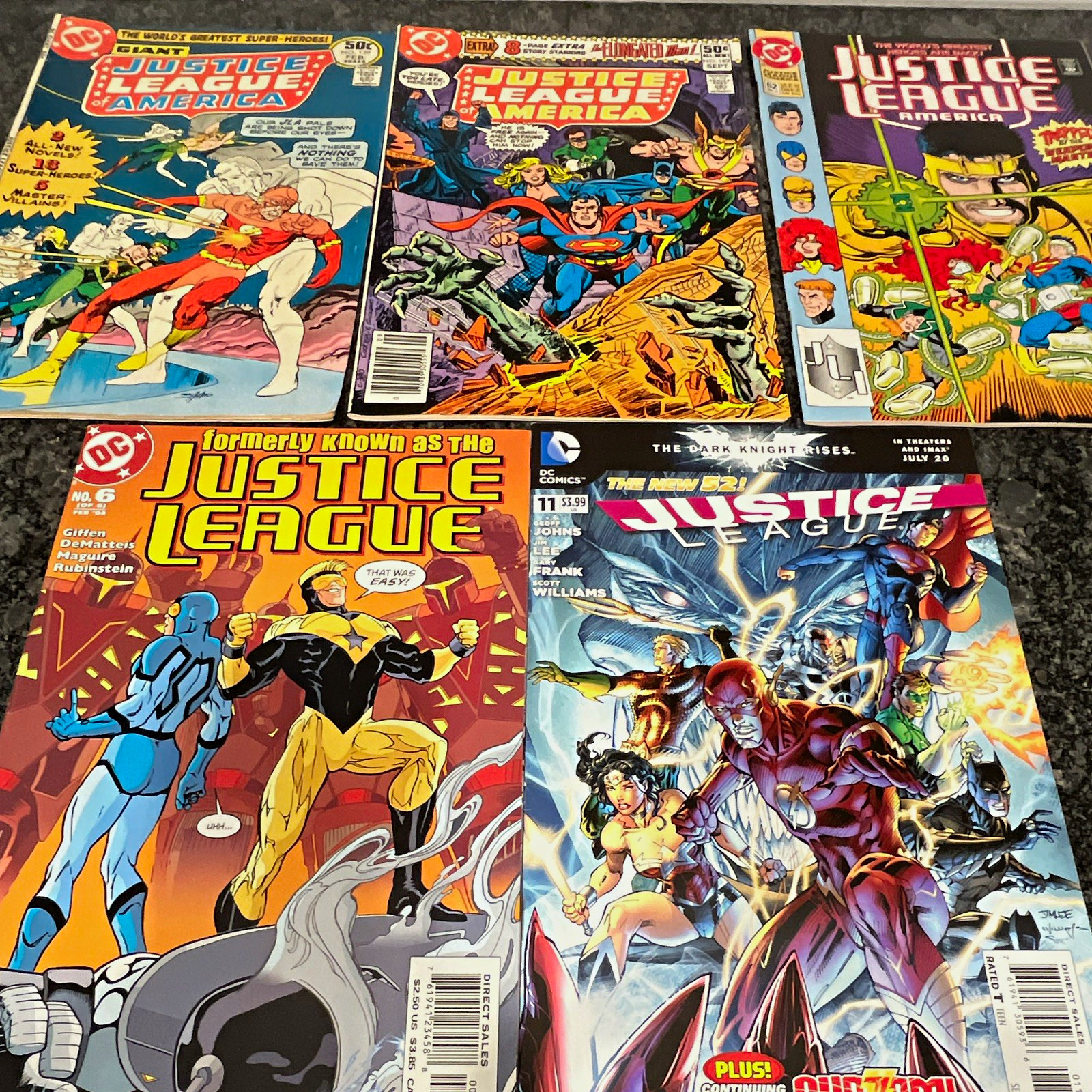 JLA-Decades!  JLA #139 (1977), #182 (1980), #62 (1992), JL #6 (2004)
