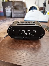 UPC 049353000299 product image for Sharp Digital Alarm Clock AccuSet Automatic Set, .9in White LED Display, SPC476 | upcitemdb.com