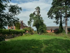 Photo 6x4 Stretford Court and Derelict Barn These two brick structures ar c2019