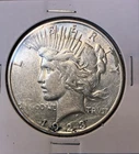 1923 S 90% Silver Peace Dollar -.7734 Ounce Silver