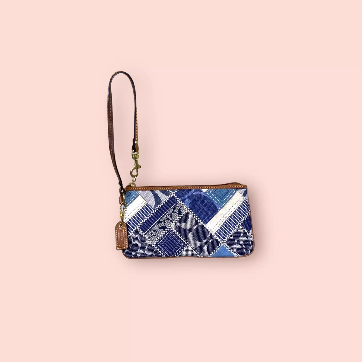 Designer wristlet hotsell pouch