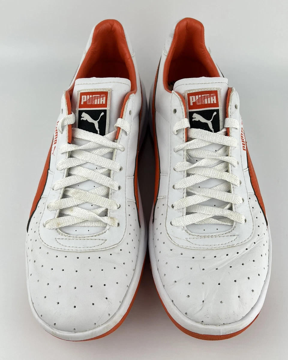 White and orange sales puma shoes