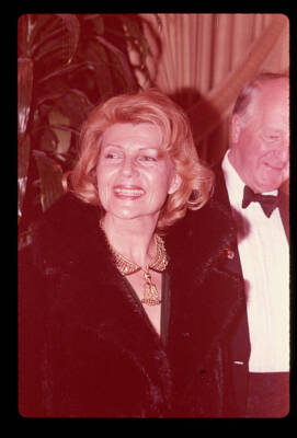 Rita Hayworth posing for photographers She is wearing a fur coat a- Old Photo