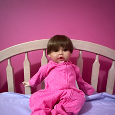 Beautiful baby girl, doll Madeline. Plush body . Comes with Six outfits, diapers