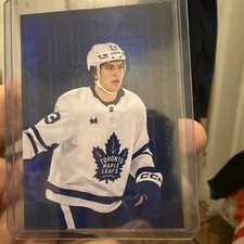 2023-24 Upper Deck Hockey Series 2 Matthew Knies FLUORESCENCE Blue 28/50