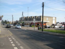 Photo 6x4 Jones Corner Canvey Island A small parade of shops on Long Road c2009